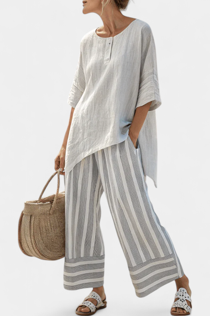 Daisy Komplet z Asymetryczną Bluzką i Spodniami w Paski dla Nowoczesnego i Eleganckiego Stylu