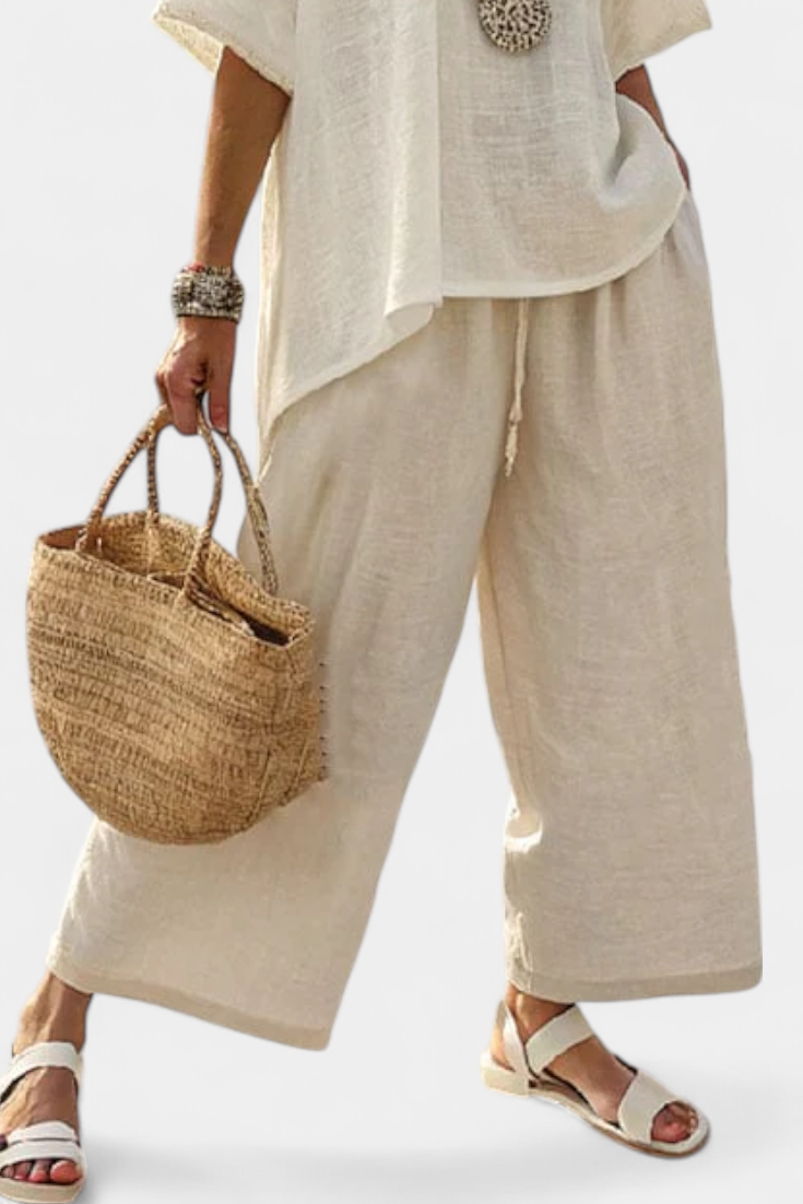 Komplet Minimalistyczny Daisy w surowych tonach z oversize'ową bluzką i szerokimi spodniami dla prostego i eleganckiego stylu